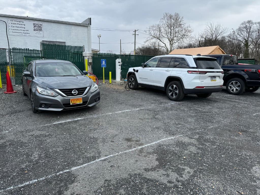 Open-air EV charging stalls with clear EV signage near West Hyattsville Metro