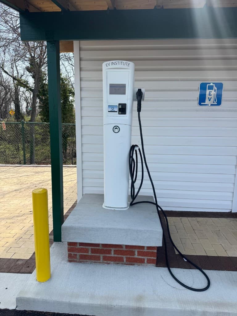 Covered Level 2 EV charger under a clean shelter at our Hyattsville facility